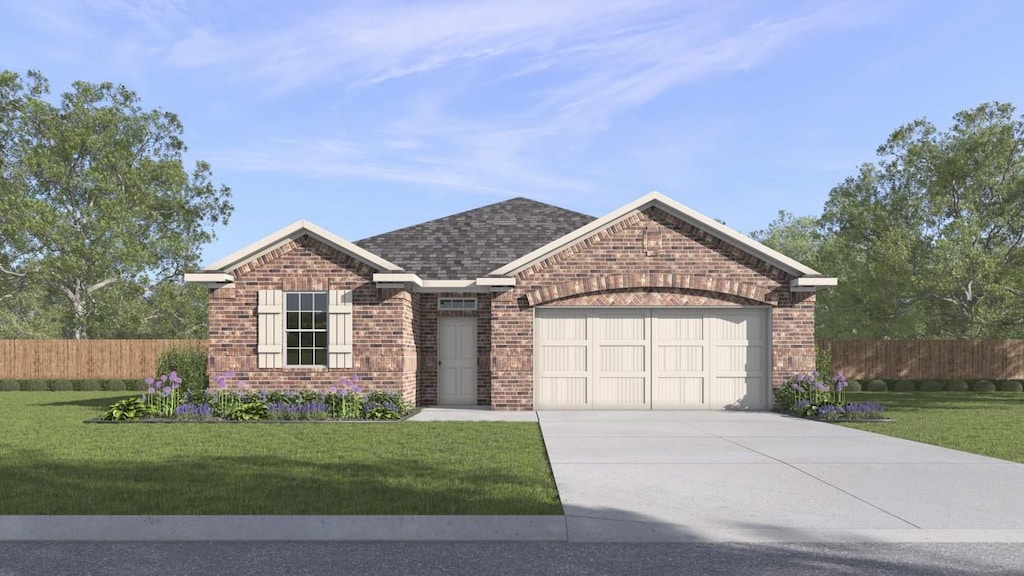 view of front of home with a front lawn and a garage