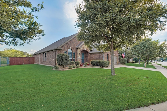 view of front facade with a front yard