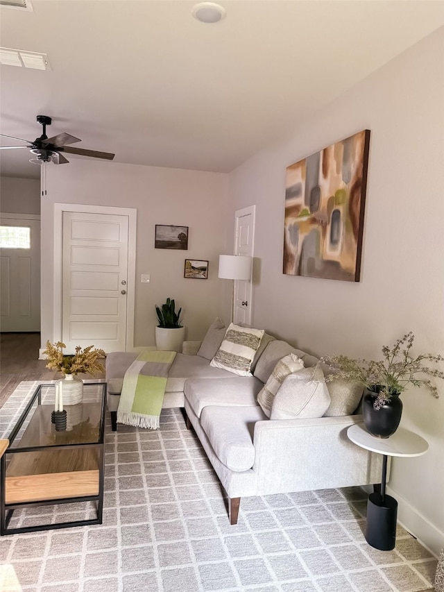 living room featuring ceiling fan