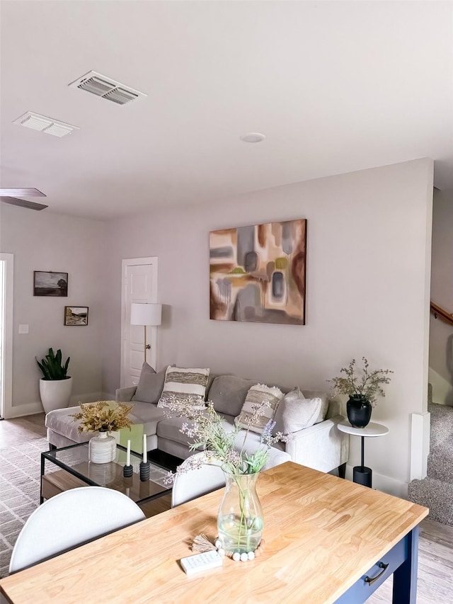 living room with light hardwood / wood-style floors