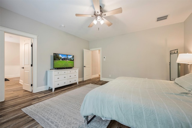 bedroom featuring hardwood / wood-style flooring and ceiling fan