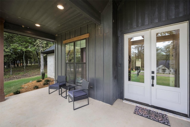 doorway to property featuring french doors