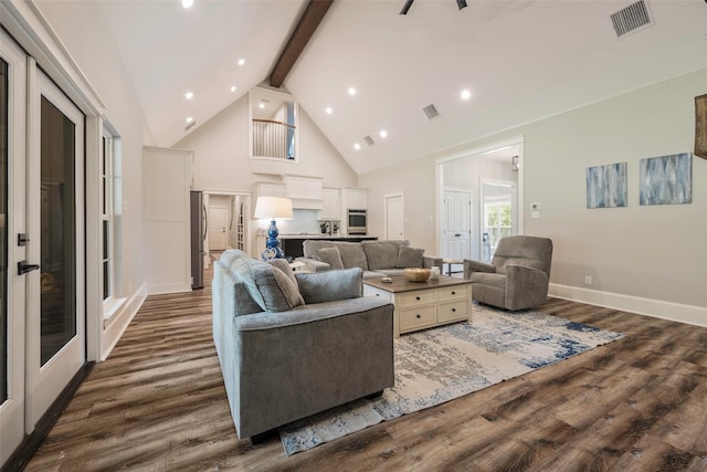 living room with beamed ceiling, high vaulted ceiling, and dark wood-type flooring