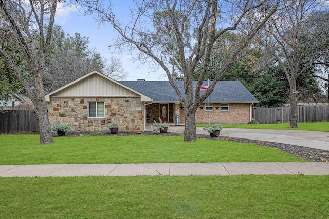 single story home with a front yard