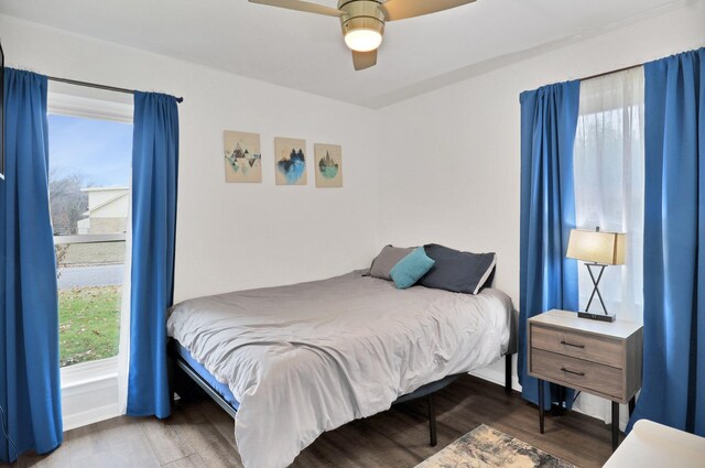 bedroom featuring wood-type flooring and ceiling fan