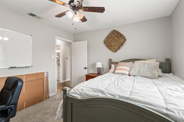 carpeted bedroom with ceiling fan