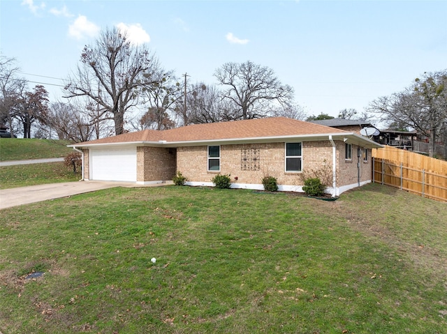 single story home with a front yard and a garage