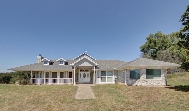 view of front of property featuring a porch and a front lawn