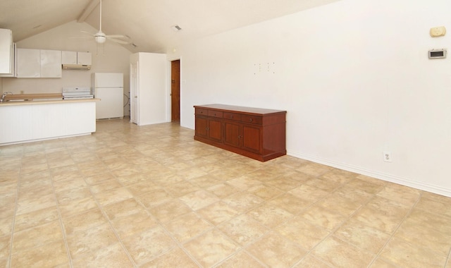 interior space with ceiling fan, sink, and lofted ceiling