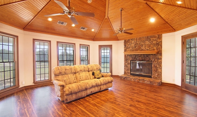 living room with wood ceiling, ceiling fan, a fireplace, and dark wood-type flooring