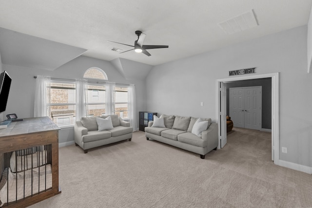 living room with lofted ceiling, light carpet, and ceiling fan