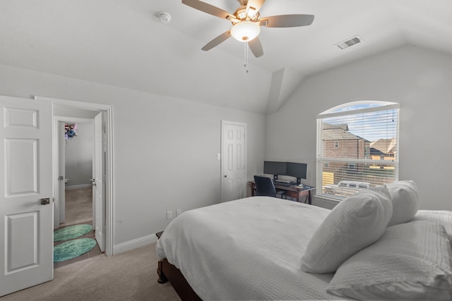 carpeted bedroom featuring lofted ceiling and ceiling fan