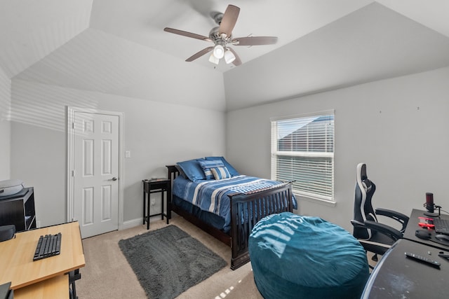 bedroom with vaulted ceiling, light carpet, and ceiling fan