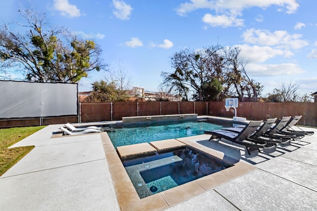 view of swimming pool with an in ground hot tub and a patio