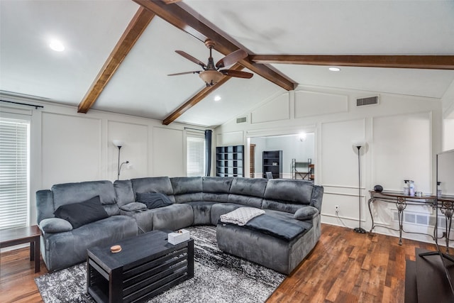 living room featuring lofted ceiling with beams, ceiling fan, and dark hardwood / wood-style flooring