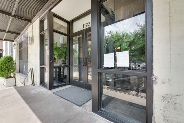 doorway to property featuring french doors