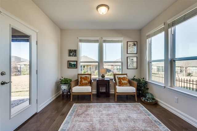 living area with dark wood-type flooring