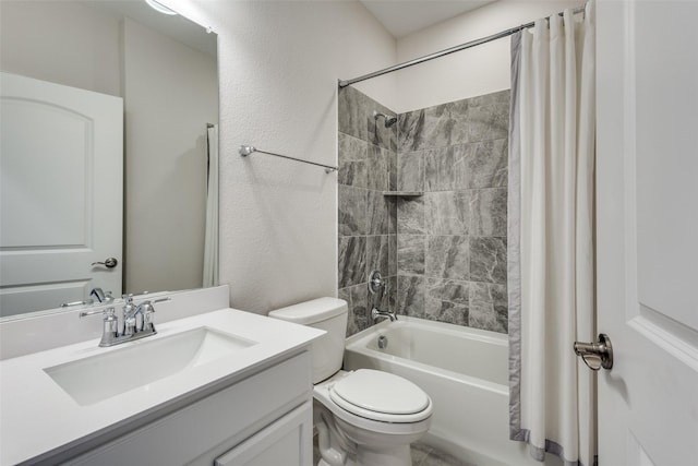 full bathroom featuring shower / tub combo with curtain, vanity, and toilet