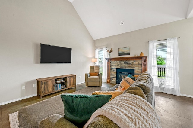 living room with a fireplace, high vaulted ceiling, and baseboards