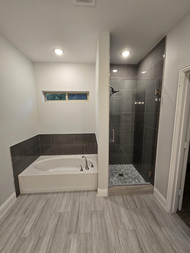 bathroom with plus walk in shower