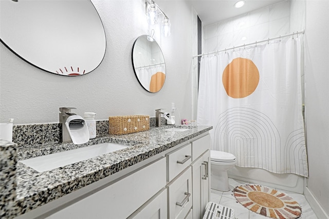 full bathroom featuring tile patterned floors, vanity, shower / bath combination with curtain, and toilet