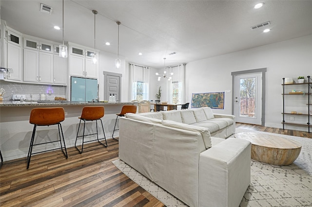 living room featuring dark hardwood / wood-style flooring