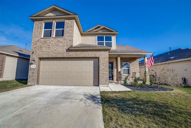 view of front facade featuring a front lawn and a garage