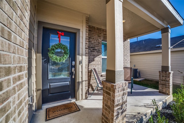 property entrance with covered porch