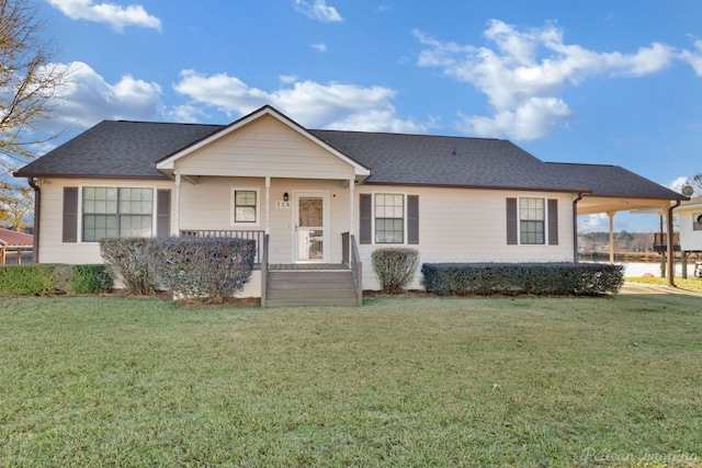 ranch-style house featuring a front lawn and covered porch