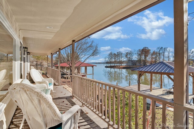 balcony featuring a water view