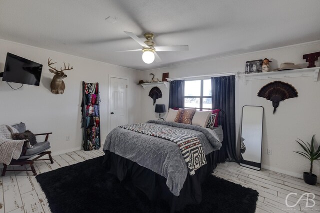 bedroom featuring ceiling fan and light wood-type flooring