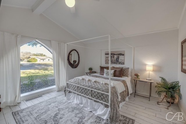 bedroom with vaulted ceiling with beams, ceiling fan, and light wood-type flooring