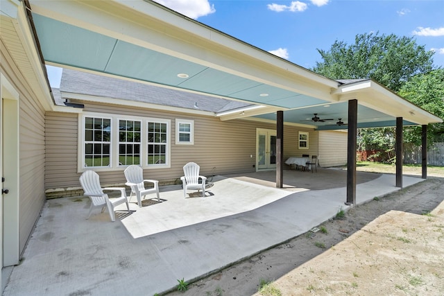 view of patio featuring ceiling fan and french doors