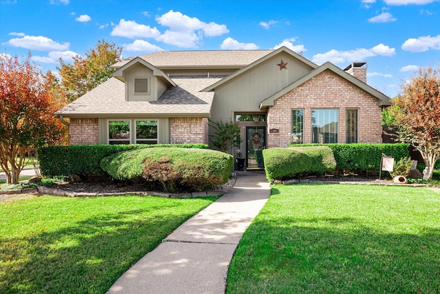 view of property with a front lawn