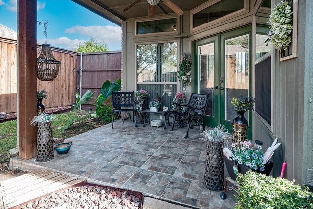 view of patio with ceiling fan and french doors