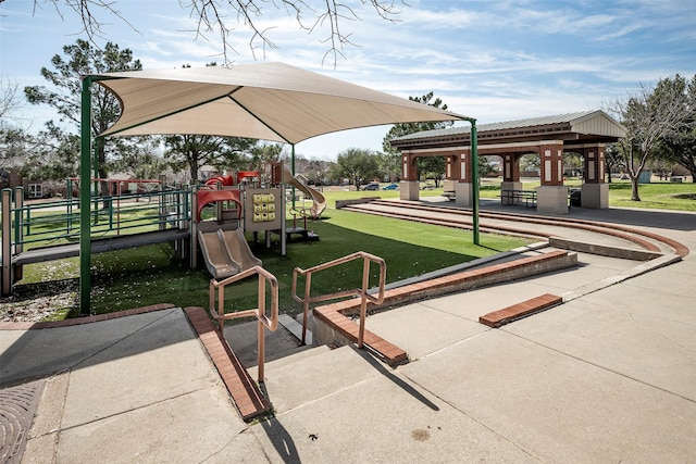 view of property's community featuring a playground