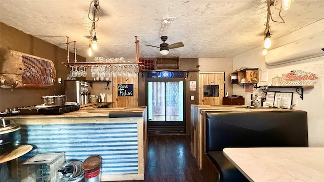 kitchen featuring wood finished floors and a ceiling fan