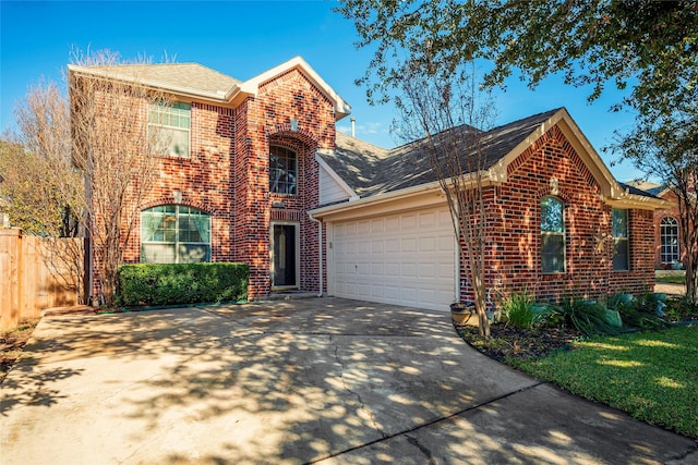 front of property with a garage