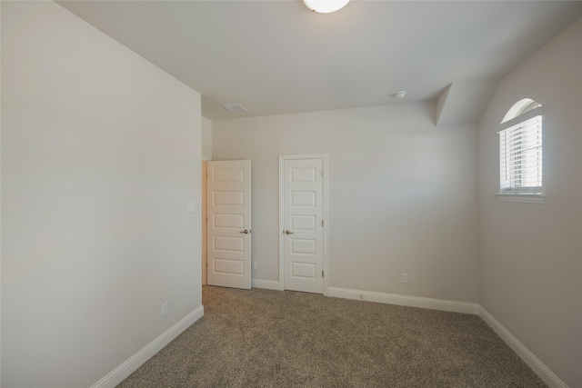 view of carpeted spare room