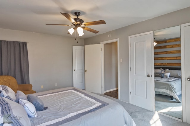 carpeted bedroom with ceiling fan