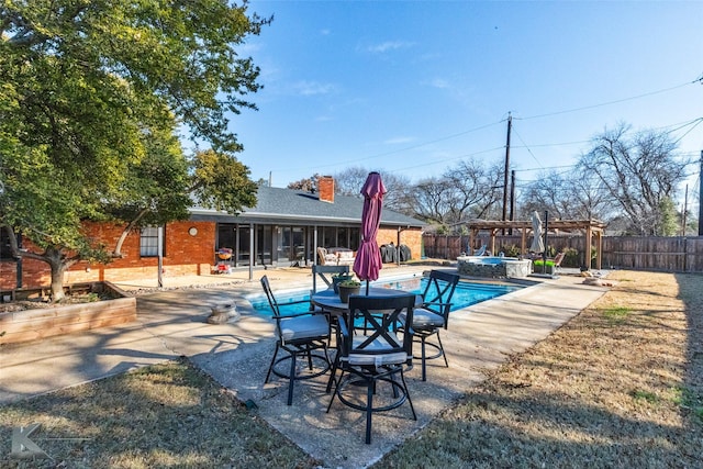 view of swimming pool with a patio, an in ground hot tub, and a pergola