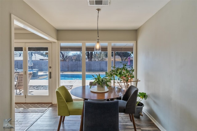 dining room featuring hardwood / wood-style flooring