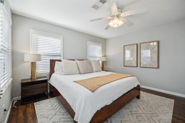 bedroom featuring hardwood / wood-style floors and ceiling fan