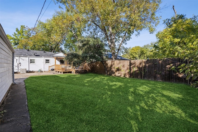 view of yard with a deck