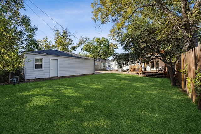 view of yard with a wooden deck