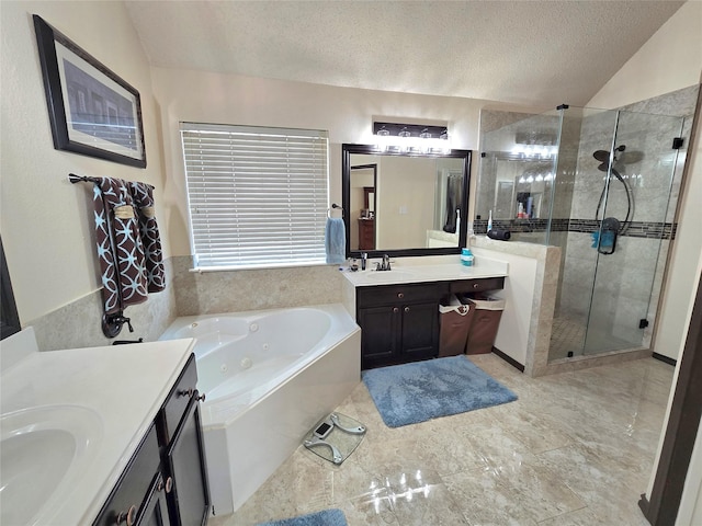 bathroom featuring vanity, a textured ceiling, and plus walk in shower