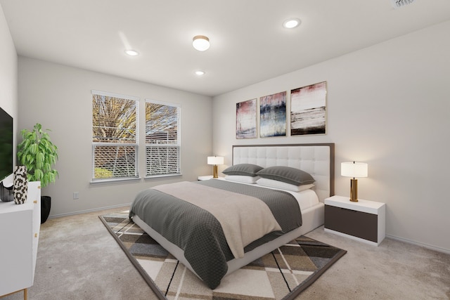 bedroom with light colored carpet