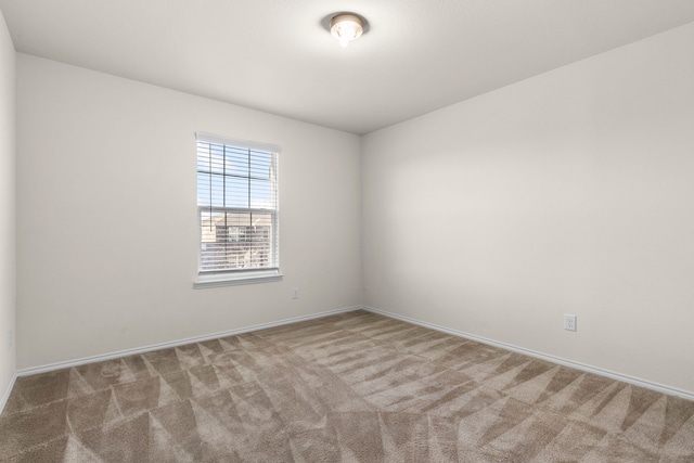 spare room with carpet flooring