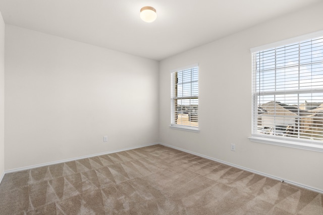 view of carpeted spare room