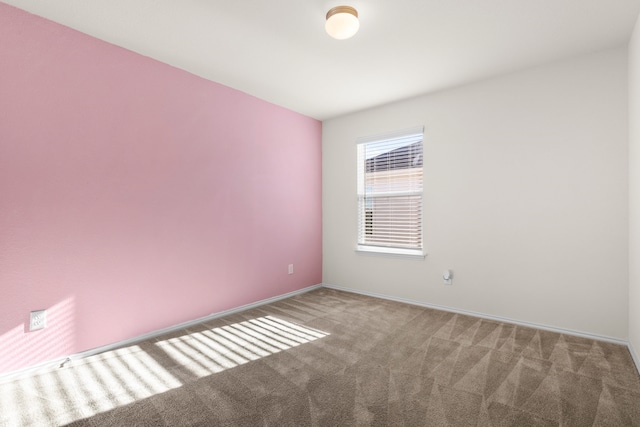 view of carpeted spare room